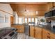 Functional kitchen with stainless steel appliances and easy access to the dining room at 5695 N Red Oak Dr, Greenfield, IN 46140