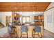 Well-appointed kitchen with a center island, bar stool seating, and modern appliances at 5695 N Red Oak Dr, Greenfield, IN 46140