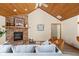 Comfortable living room featuring a brick fireplace and cozy seating arrangement at 5695 N Red Oak Dr, Greenfield, IN 46140