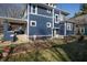 Backyard featuring a covered patio with a garden in a partially shaded area at 6101 Broadway St, Indianapolis, IN 46220
