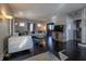 Bright living room with hardwood floors, neutral paint, and modern furniture at 6101 Broadway St, Indianapolis, IN 46220