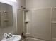 Bathroom featuring a shower and tub combo, sink, and a mirror at 618 W Mckenzie Rd, Greenfield, IN 46140