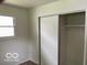 Bedroom featuring closet space and a window that provides natural light at 618 W Mckenzie Rd, Greenfield, IN 46140