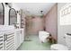 Stylishly remodeled bathroom with tiled walls, large shower, soaking tub, and modern vanity at 6464 Whitley Ln, Indianapolis, IN 46260