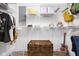 Spacious walk-in closet featuring custom shelving, ample storage, and organization solutions at 6464 Whitley Ln, Indianapolis, IN 46260