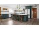 Bright kitchen with an island, bar stools and modern finishes at 6464 Whitley Ln, Indianapolis, IN 46260