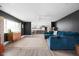 Spacious living room with a large sectional couch and open floor plan at 6464 Whitley Ln, Indianapolis, IN 46260