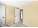 Bright bedroom featuring light-colored walls and a closet at 6601 Valley Forge Ct, Indianapolis, IN 46237