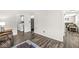 Neutral living space with connections to laundry area and cozy living room at 6601 Valley Forge Ct, Indianapolis, IN 46237