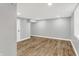 Finished basement with hardwood floors, fresh paint, and updated features at 6644 Mcfarland Rd, Indianapolis, IN 46227