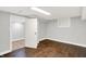 Unfinished basement features painted concrete walls and flooring at 6644 Mcfarland Rd, Indianapolis, IN 46227