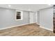 Finished basement with hardwood floors and a window for plenty of natural light at 6644 Mcfarland Rd, Indianapolis, IN 46227