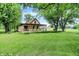Attractive single-Gathering home with a lovely front yard and covered porch at 6644 Mcfarland Rd, Indianapolis, IN 46227