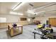 Spacious garage featuring plenty of storage space and lighting at 6644 Mcfarland Rd, Indianapolis, IN 46227