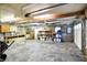 View of garage interior with tool and equipment storage and work bench at 6644 Mcfarland Rd, Indianapolis, IN 46227
