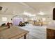 Spacious garage featuring plenty of storage space and lighting at 6644 Mcfarland Rd, Indianapolis, IN 46227
