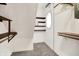 Spacious walk-in closet features wood shelving and carpeted flooring at 6644 Mcfarland Rd, Indianapolis, IN 46227