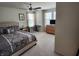 Bright bedroom features a comfortable bed and ample natural light from the windows at 6731 Keepsake Dr, Whitestown, IN 46075