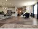 Open concept living space with a dining area, kitchen, and an entry hallway at 6731 Keepsake Dr, Whitestown, IN 46075