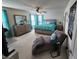 Spacious primary bedroom with a king bed, dresser, and chaise lounge at 6731 Keepsake Dr, Whitestown, IN 46075