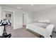 Bedroom features an open doorway to a utility room and ensuite bathroom at 7171 E Rising Sun S Cir, Camby, IN 46113