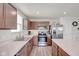 Modern kitchen featuring stainless steel appliances, ample counter space, and stylish cabinetry at 7171 E Rising Sun S Cir, Camby, IN 46113
