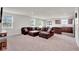 Spacious living room provides ample seating and natural light, seamlessly flowing into the kitchen at 7171 E Rising Sun S Cir, Camby, IN 46113
