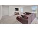 Bright living room with large windows and comfortable seating, perfect for relaxing or entertaining at 7171 E Rising Sun S Cir, Camby, IN 46113