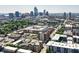 Downtown skyline view of the city surrounded by lush green trees and well-developed neighborhoods at 721 E North St # 2C, Indianapolis, IN 46202