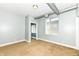 Bedroom with large window, carpeting and an exposed duct system at 721 E North St # 2C, Indianapolis, IN 46202