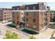 Beautiful multi-story condo building with a brick facade, modern design and a welcoming entrance at 721 E North St # 2C, Indianapolis, IN 46202