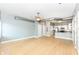 Open floorplan featuring spacious living room with an adjacent kitchen with stainless steel appliances at 721 E North St # 2C, Indianapolis, IN 46202