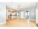 Open floor plan showing living room into the kitchen with an island, and two doorways at 721 E North St # 2C, Indianapolis, IN 46202