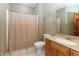 Bathroom features ceramic tile, neutral paint, bath tub, and vanity with light wood cabinetry at 725 Ridge Gate Dr, Brownsburg, IN 46112