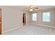 Bedroom featuring carpet, neutral paint, and two windows for natural light at 725 Ridge Gate Dr, Brownsburg, IN 46112