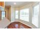 Bright breakfast nook with large windows offering backyard and water views at 725 Ridge Gate Dr, Brownsburg, IN 46112
