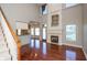 Spacious living room with fireplace and large windows at 725 Ridge Gate Dr, Brownsburg, IN 46112