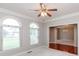 Living room with many windows and views into dining room at 725 Ridge Gate Dr, Brownsburg, IN 46112