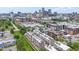 Aerial view showcasing townhomes amid a cityscape, blending urban and residential living at 751 Switchyard Pl, Indianapolis, IN 46202