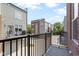 View from private balcony featuring a black metal railing overlooking the community buildings at 751 Switchyard Pl, Indianapolis, IN 46202