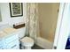 Clean bathroom featuring modern fixtures, stylish shower curtain, and neutral tones at 751 Switchyard Pl, Indianapolis, IN 46202