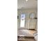 Entryway with a wooden floor and a white storage cabinet at 751 Switchyard Pl, Indianapolis, IN 46202