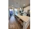 Spacious kitchen with a large island and modern appliances at 751 Switchyard Pl, Indianapolis, IN 46202