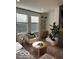 Cozy living room nook featuring a comfortable chair, side table, natural light and modern decor at 751 Switchyard Pl, Indianapolis, IN 46202