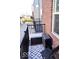 View of a patio with seating and black metal railings at 751 Switchyard Pl, Indianapolis, IN 46202