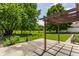 The backyard patio features a pergola perfect for outdoor relaxation at 8015 Ridgegate East Dr, Indianapolis, IN 46268