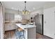 Charming kitchen with stainless steel appliances, and modern cabinetry offering a stylish cooking space at 8315 Exton Rd, Indianapolis, IN 46239