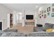 Comfortable living room featuring neutral tones, modern decor, and an open floor plan for easy entertaining at 8315 Exton Rd, Indianapolis, IN 46239
