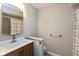 Bathroom with vanity, toilet, and shower/tub combo at 8955 Stonegate Rd # A, Indianapolis, IN 46227