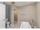 Modern bathroom featuring standalone tub, shower, and stylish tile flooring at 8955 Stonegate Rd # A, Indianapolis, IN 46227